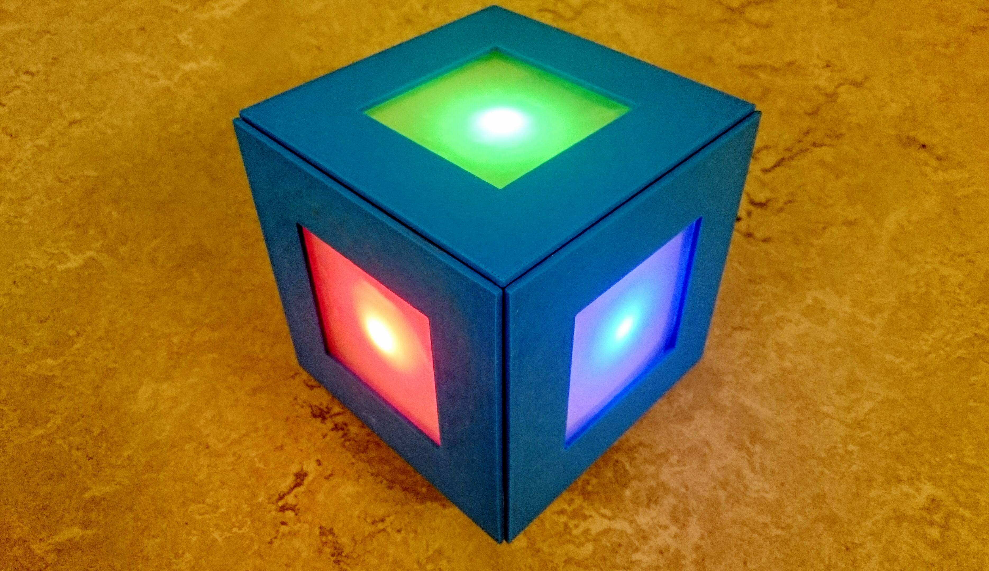 A cube with green red and blue glowing sides