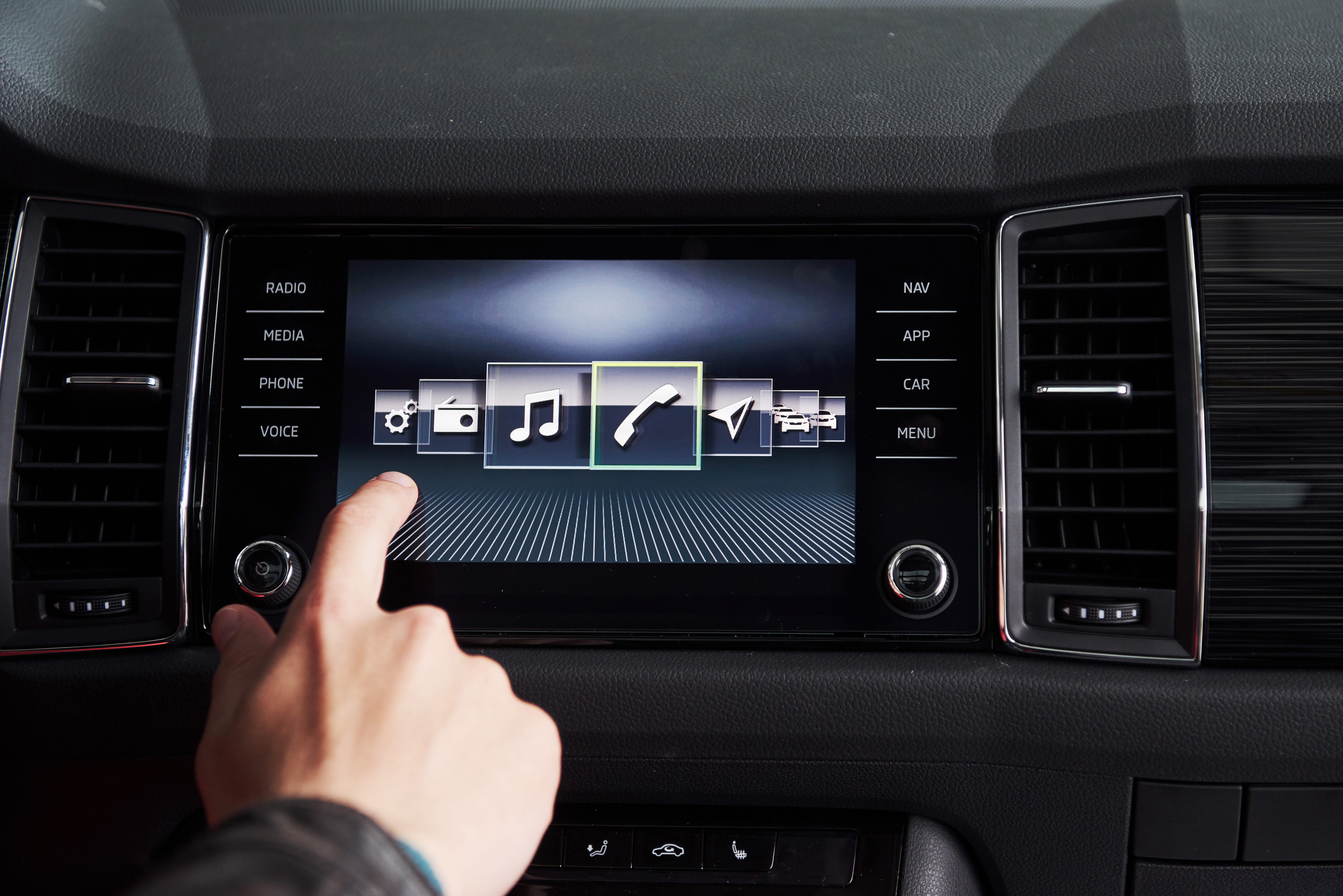 person indoor monitor window photo car screen front holding television sitting man microwave bus player stereo video room standing