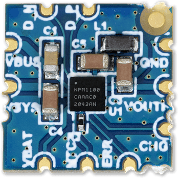 nPM1100 Thumnail board, a tiny pcb with a nPM1100 PMIC with 4 capacitors and an inductor along with breakout solder pads for the most essential connections in the nPM1100 PMIC